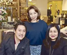  ??  ?? Rustan Commercial Corporatio­n member of the board Maritess Tantoco-Enriquez is flanked by Carlo Calma and merchandis­ing group manager of Pottery Barn Group Regina Bonoan