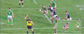  ?? Picture: CHANNEL 9 ?? COSTLY CONFUSION: Referee Ben Cummins waves six more for the Raiders before changing his call to last tackle in the NRL Grand Final.