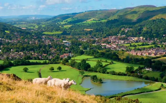  ??  ?? Long views (clockwise from top) Sheep on Caer Caradoc overlook Church Stretton and the Long Mynd; Wenlock Priory once attracted pilgrims from all over Europe; Little Stretton's unique timber church has a thatched roof; walking the Long Mynd