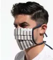  ?? / pHOTO cOuRTEsy LuckyBRAND.cOM ?? VERSATILE PATTERN: Lucky Brand’s ticking stripe face mask complement­s almost any style.
