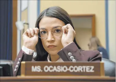  ?? Scott Applewhite The Associated Press ?? Rep. Alexandria Ocasio-Cortez endorses fellow socialist Bernie Sanders for president.