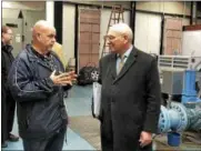  ?? NICHOLAS BUONANNO — NBUONANNO@TROYRECORD.COM ?? Ed Dillon, the water pump station plant operator, explains something to U.S. Rep. Paul Tonko during a tour of the pump station on Cross Street in Troy Thursday.