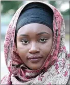  ??  ?? Tears: Shaidat Olufowobi, 18, said she was sent home for refusing to remove hijab