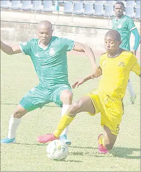 ?? ( Pic: Sanele Jele) ?? Green Mamba’s Musa Dlamini ( L) in a tussle for the ball with Malanti’s Sandile Mnisi. The tie ended in a goalless draw yesterday at Mavuso Sports Centre.