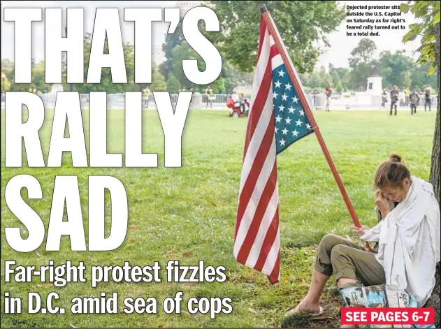  ??  ?? Dejected protester sits outside the U.S. Capitol on Saturday as far right’s feared rally turned out to be a total dud.
