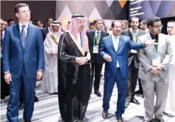  ??  ?? Energy Minister Khalid Al-Falih, second left, and Russian Energy Minister Alexander Novak, left, visit the Saudi pavilion at Expo 2017 in Astana. (SPA)