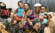  ?? PEDRO PORTAL pportal@miamiheral­d.com ?? Hortense Mitchell, second from left, with her mother, Viola Richards, and her granddaugh­ters Le’Shay, 5, and Elaine, 2, at their Florida City house.