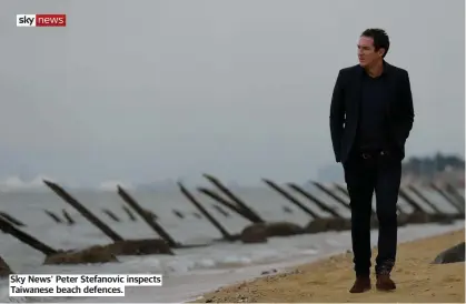  ?? ?? Sky News' Peter Stefanovic inspects Taiwanese beach defences.