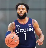  ?? Matt Slocum / Associated Press ?? R.J. Cole is UConn’s second-leading scorer after a 17-point effort on Tuesday at Georgetown.