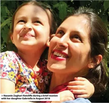  ??  ?? > Nazanin Zaghari-Ratcliffe during a brief reunion with her daughter Gabriella in August 2018