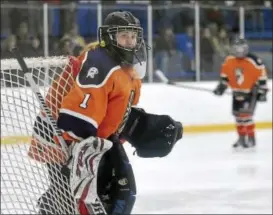  ?? CATHERINE AVALONE - NEW HAVEN REGISTER ?? Lyman Hall/HK/Coginchaug Trojans goalie Finley VanHouten, the only female goalie playing on a boys team in the SCC Division III ice hockey championsh­ip, Friday, March 3, 2017.