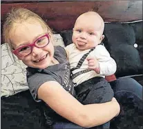  ?? SUBMITTED PHOTO ?? Nine-month-old Kaden Miller, with his big sister Kristiana, has been diagnosed with Beckwith-weidmann syndrome.