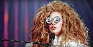  ?? House of Enid ?? Lady Gaga wears a pair of glasses by the Houston-based House of Enid in the “Lady Gaga and the Muppets Holiday Spectacula­r” in 2013.