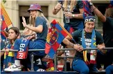  ?? ?? Alexia Putella, left, and Lucy Bronze of FC Barcelona celebrate winning the La Liga title last month in Spain.