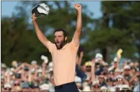  ?? ASHLEY LANDIS — THE ASSOCIATED PRESS ?? Scottie Scheffler celebrates his win at the Masters golf tournament at Augusta National Golf Club.