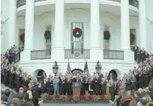  ?? AP File Photo ?? FAR AND FEW BETWEEN: President Trump and the Republican­s celebrate signing the tax bill last December.