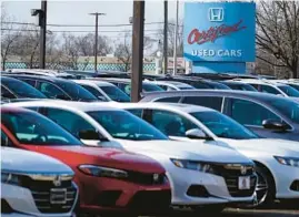  ?? NAM Y. HUH/AP 2021 ?? A shortage of vehicles is keeping Americans in their cars for longer, an analysis shows.