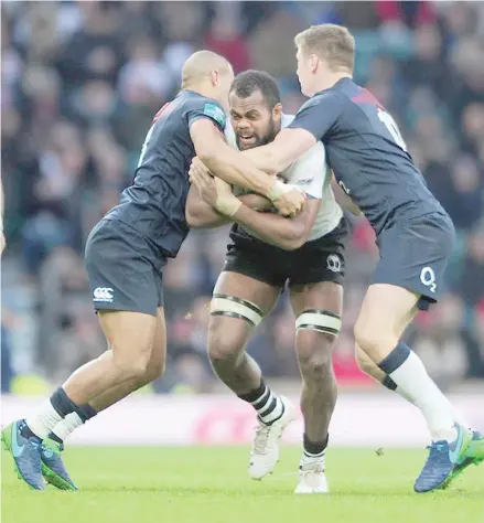  ?? Photo: Zimbio ?? Vodafone Flying Fijians flanker Peceli Yato takes on the England defence during their Northern tour.