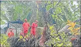  ?? ANI ?? An NDRF team clears trees in vulnerable areas as a precaution­ary measure for Cyclone Asani, in Andaman on Sunday.