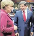  ?? Foto: afp ?? Treffen in Brüssel: Kanzlerin Angela Merkel, Premier Ahmed Davutoglu.