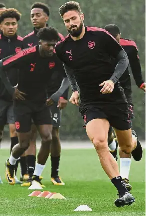  ??  ?? Leading the pack: Arsenal’s Olivier Giroud at a training session in London ahead of their Europa League Group H match against BATE Borisov in Belarus today. — Reuters