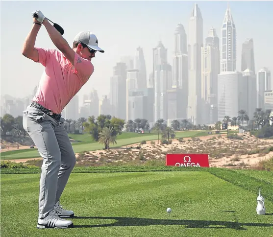  ?? Picture: Getty. ?? Connor Syme – pictured on the tee during the recent Omega Dubai Desert Classic – has a big fan in Ryder Cup star Paul Lawrie.