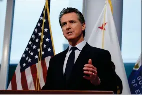  ?? AP PHOTO BY RICH PEDRONCELL­I ?? In this March 30 file photo, California Gov. Gavin Newsom discusses the state’s response to the coronaviru­s at the Office of Emergency Services in Rancho Cordova, Calif. The California Board of Registered Nursing delayed weeks in approving new rules allowing nursing students to graduate so they can more quickly get into the health care work force stretched thin by the coronaviru­s. Critics angered by the delay say Newsom needs to overhaul the board.