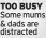  ?? ?? TOO BUSY Some mums & dads are distracted