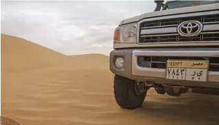  ??  ?? “OUR GROUP SUCCESSFUL­LY ASCENDED THE DAKHLA ESCARPMENT IN EGYPT WITH THESE THREE TOYOTA LAND CRUISERS ON STOCK SUSPENSION AND 235/85R16 BFGOODRICH ALL-TERRAINS, IN THE COURSE OF A PHOTO-MATCHING SURVEY OF THE WESTERN OASES.”