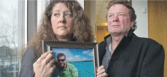  ?? JASON PAYNE/FILES ?? Margie Gray, seen with husband Mark, says the Independen­t Investigat­ions Office is held back by “in-house problems.” The two are awaiting a probe into their son’s death.