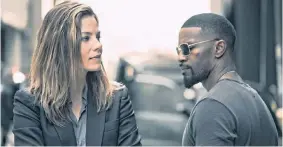  ??  ?? Michelle Monaghan and Jamie Foxx in Sleepless.