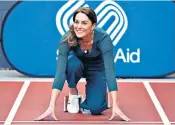  ??  ?? Support: the Duchess of Cambridge hits the track at a Sportsaid event