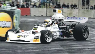  ??  ?? Aucklander Clark Proctor guides his Formula 5000 car around the track.