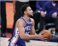  ?? DARRON CUMMINGS — THE ASSOCIATED PRESS ?? Philadelph­ia 76ers’ Ben Simmons shoots during the first half of an NBA basketball game against the Indiana Pacers, Friday.