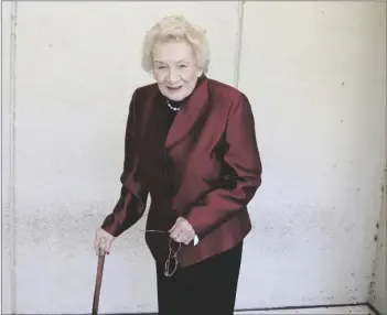  ?? AP PHOTO/JENNIFER SINCO KELLEHER ?? Native Hawaiian heiress Abigail Kinoiki Kekaulike Kawananako­a poses outside a Honolulu courthouse in 2019.