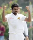  ?? — AFP ?? Sri Lanka’s Dilruwan Perera celebrates after he dismissed Bangladesh’s Mehedi Hasan.