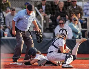  ?? NWA Democrat-Gazette/Brent Soule) ?? Bentonvill­e West’s Jordan Durham slides into home plate safely during Tuesday’s 6A-West Conference softball game against Rogers Heritage at Wolverine Softball Complex in Centerton. The Lady Wolverines defeated the War Eagles 5-2.
(Special to the