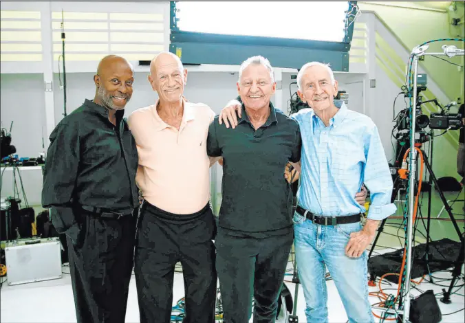 ?? Ryan Yezak The Associated Press ?? Jessay Martin, 68, from left, Robert Reeves, 78, Michael Peterson, 65, and William Lyons, 77, pose for a photo last fall in Cathedral City, Calif. The four friends, known as the Old Gays, are among a growing number of seniors making names for themselves on social media with the help of decades-younger followers.
