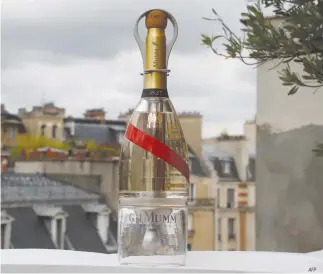  ?? AFP ?? THIS BOTTLE OF Mumm Grand Cordon Stellar champagne, designed by French Interior designer Octave de Gaulle, is adapted to pour the bubbly liquid in zero gravity conditions.