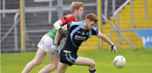  ??  ?? Fiachra Grennan of St John’s goes on th attack. Pic: Carl Brennan.