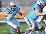  ?? JOURNAL FILE ?? Last year’s Gatorade New Mexico Player of the Year, Cleveland running back Dorian Lewis, and the Storm visit Clovis on Friday night in a Class 6A state semifinal game.