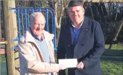  ??  ?? The Hunton playground, and Dave Byford, right, presenting a cheque to Gary Thomas