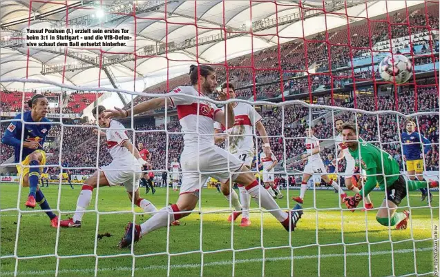  ??  ?? Yussuf Poulsen (l.) erzielt sein erstes Tor beim 3:1 in Stuttgart - und die VfB-Defensive schaut dem Ball entsetzt hinterher.