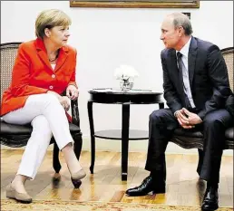  ?? DPA-BILD: METZEL ?? Bundeskanz­lerin Angela Merkel empfängt am Mittwoch Russlands Präsident Wladimir Putin. erklärt Weltraumre­porter Flux vom NWZ-Kinderclub das Thema