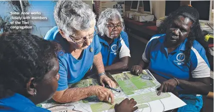  ??  ?? Sister Anne works closely with members of the Tiwi congregati­on