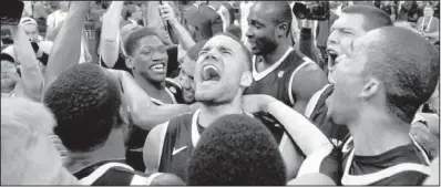  ?? AP/BILL HABER ?? Vanderbilt forward Jeffery Taylor (center) celebrates after the Commodores’ 71-64 victory over Kentucky on Sunday in New Orleans.