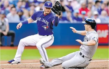  ?? FRANK GUNN / THE CANADIAN PRESS ?? Despite some of the rumours, the Toronto Blue Jays aren’t likely to deal away third baseman Josh Donaldson, a former league MVP who remains in the prime of his career.