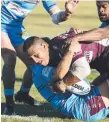  ?? Picture: FRASER COAST CHRONICLE ?? Burleigh’s Sami Sauiluma is a handful for the Capras.