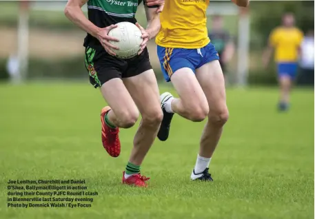  ??  ?? Joe Lenihan, Churchill and Daniel O’Shea, BallymacEl­ligott in action during their County PJFC Round 1 clash in Blennervil­le last Saturday evening Photo by Domnick Walsh / Eye Focus