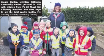  ?? (Pic: Courtesy Kildorrery Community Garden) ?? Joanne Hunter, secretary Kildorrery Community Garden, pictured in 2019 with children from It’s All About Kids Kildorrery Preschool who were eager to see the local garden facility.